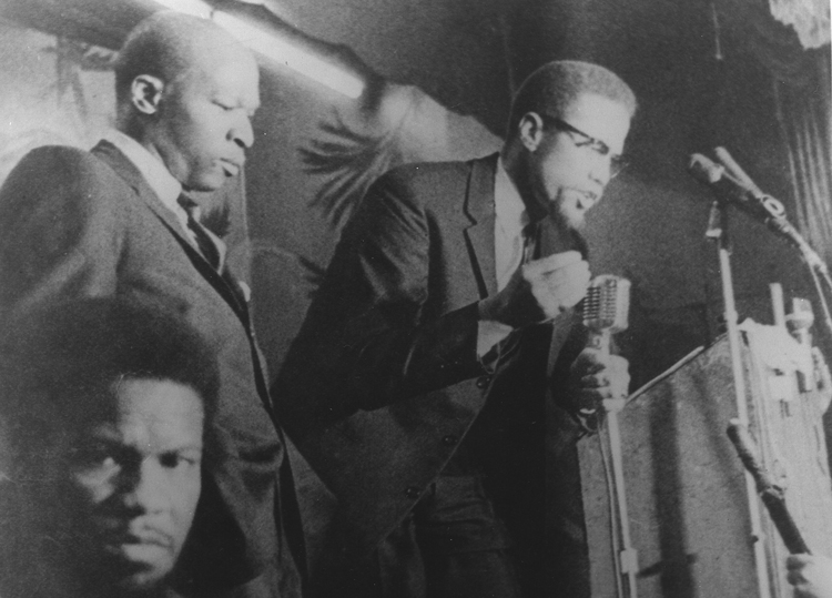 Malcolm X speaking at Audubon Ballroom in Harlem, New York, Feb. 15, 1965, giving speech that is excerpted here. He was assassinated when he spoke at the ballroom six nights later.