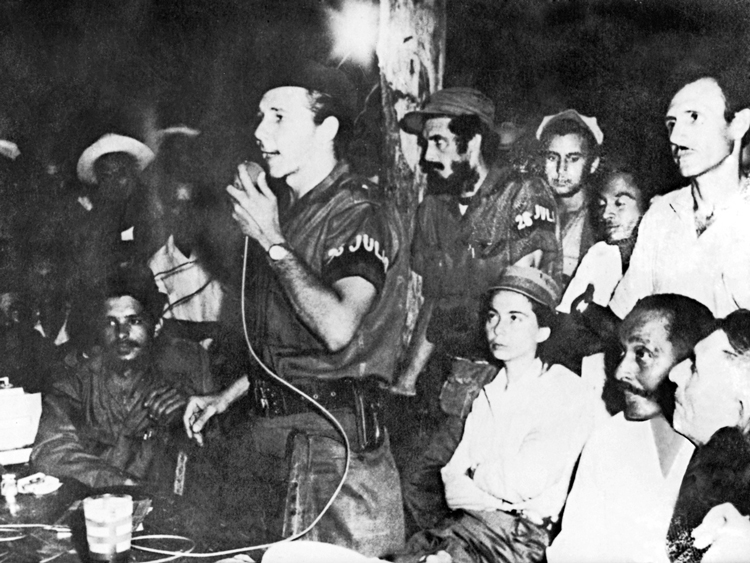 In address to congress of peasants near Rebel Army’s Second Front headquarters in eastern Cuba, Sept. 21, 1958, Raúl Castro explains July 26 Movement’s revolutionary program — taking land out of hands of big landholders and distributing to all those who work it.