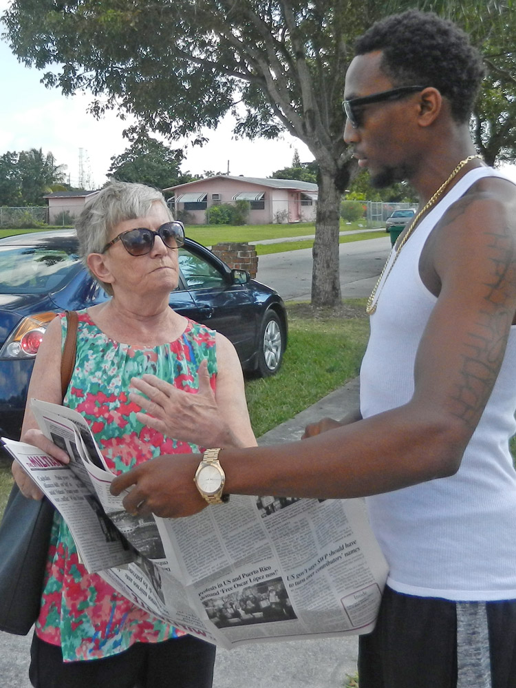 Cindy Jaquith, who was the Socialist Workers Party candidate for mayor of Miami in January 2017, talks with Robert Brooks III in West Perrine, Florida.