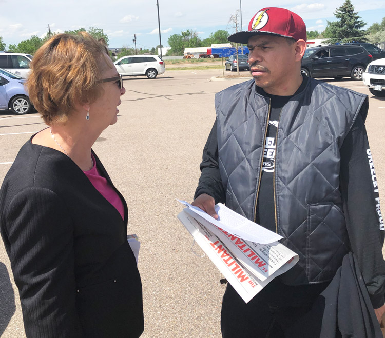 SWP presidential candidate Alyson Kennedy speaks with Angel Bernal during shift change at JBS meatpacking plant in Greeley, Colorado. “Slowing down line speed should be permanent,” Kennedy said. “Workers need to take control of production to ensure safe working conditions.”