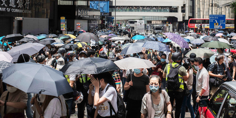 Demanding political rights, autonomy protesters block Pedder Street in Hong Kong May 27.