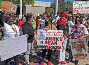 June 13 action at police station in Vallejo, California, protests dozens of police shootings there in recent years. Latest victim, Sean Monterrosa, pictured on posters, was killed on June 2.