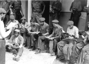 Militia members in the Escambray learning to read and write in 1961. Land reform and literacy campaign benefited peasants, helping the volunteer fighters defeat counterrevolutionary bandits, and deepened support to Cuba’s socialist revolution and its leaders.