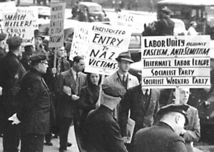 Members of Socialist Workers Party joined other groups picketing German Consulate in New York in November 1938. They demanded Washington open its doors to Jewish and other refugees, victims of Nazi brutalities as that regime began to prepare the Holocaust.