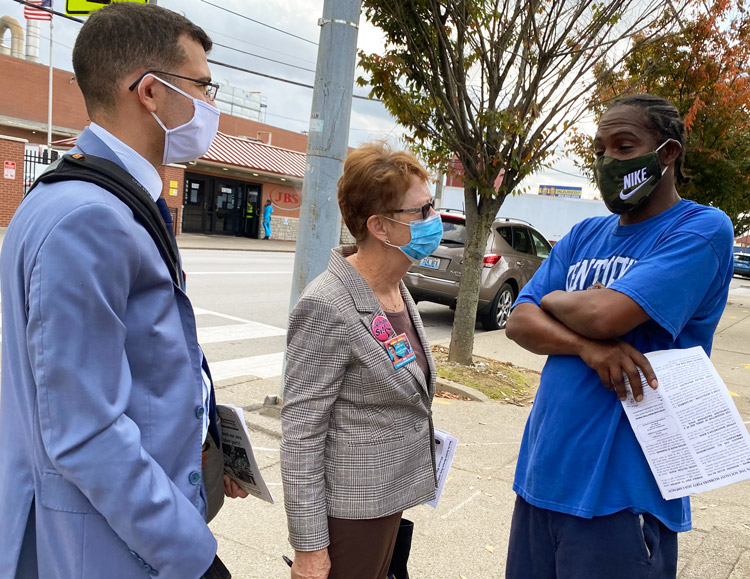 SWP candidate for president Alyson Kennedy, and Samir Hazboun, left, party’s candidate for Congress in Kentucky’s 3rd District, talk with worker at JBS packing plant in Louisville Oct. 23.