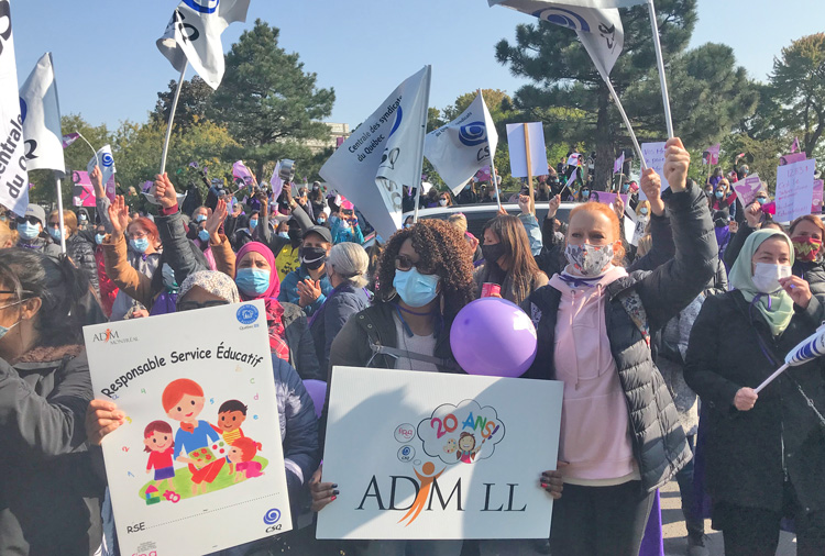 Day care workers rally at Quebec Families Ministry Sept. 21 in support of 10,000 at-home day care workers on province-wide rotating strikes since Sept. 1 for better pay, conditions.
