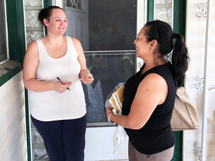 “Workers in this country have the sheer numbers, so they keep us down and divided,” Iris Lamb, left, told Socialist Workers party member Ellie García. “A powder keg is building up.”