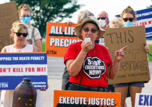 Protest at Indiana federal prison Aug. 26 against execution of a Native American, Lezmond Mitchell, opposed by Navajo Nation leaders. U.S. executions are among highest in the world.
