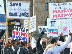 Hundreds of airline and airport workers joined to protest on Parliament Hill in Ottawa, Ontario, Oct. 20, calling on Canadian government to restart airline industry, ensure safety.