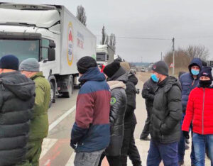 As part of strikes across Ukraine demanding back wages, uranium miners blocked major highways in Kirovograd Dec. 16. Coal miners, nurses and others are fighting over wages, conditions.