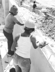 Cuban women in construction minibrigade in 1988, part of rectification process, as workers from workplaces and communities took part in voluntary labor. They built 100 child care centers in Havana in two years instead of a bureaucratic plan for less than one a year. Rectification ended as tighter U.S. embargo exacerbated shortages.