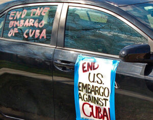 Car plastered with slogans in Chicago carcade the same day.