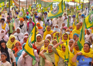 May 12 protest on the outskirts of New Delhi by women participants in Indian farmers’ movement. They called for more women to join the struggle against gov’t’s anti-farmer ‘‘reforms.”