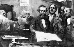 Karl Marx, holding Neue Rheinische Zeitung with Frederick Engels in 1848 German revolution, helped build Communist League, first modern working-class party. Engels wrote, “Com-munism is not a doctrine but a movement; it proceeds not from principles but from facts.”