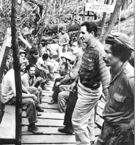 Working people and Rebel Army fighters line up at field hospital in Sierra Maestra, Cuba, 1958. Revolutionary forces’ policy was to treat peasants, combatants, wounded enemy soldiers without distinction.