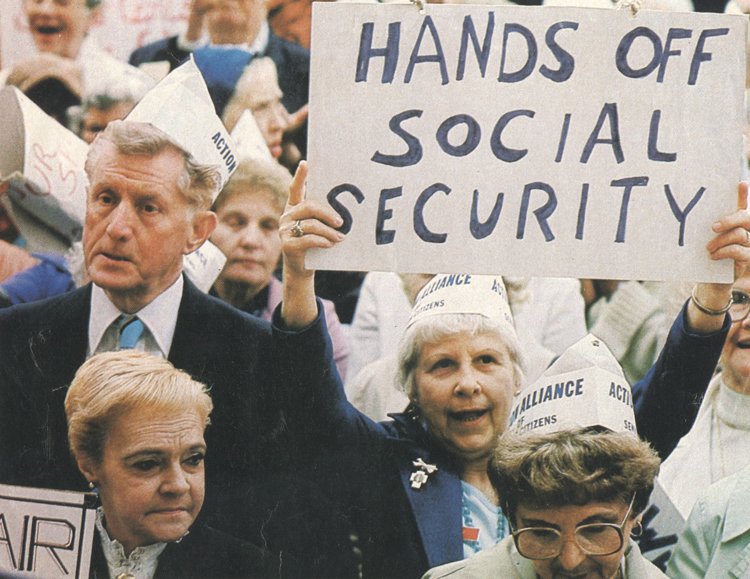 Protest in Philadelphia by retired workers against Social Security cuts in late 1980s. Rich bondholders demand government cut social wage, not profitable interest payments on government bonds, to cover rising state debts. This attack hits what working people see as a social right.