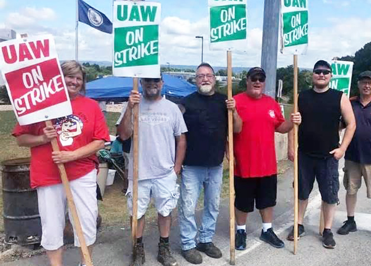 United Auto Workers members on strike at Volvo truck plant in Dublin, Virginia, June 27.