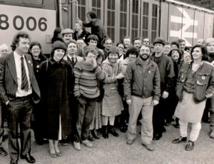 Rose Knight, fourth from left in front row, visiting fellow rail workers in Coalville, part of a solidarity delegation of National Union of Railwaymen members during 1984-85 coal strike. Inset, Knight at 2009 London protest against U.S., U.K. rulers’ war in Afghanistan.