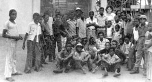 Cuban teacher in Luanda, Angola, with students, largely youth orphaned by apartheid South Africa’s invasions from 1975 to 1988. Cuba’s 425,000 volunteers, military and civilian, helped defeat South African forces. “The principles of our revolution are the moral foundation of our struggle,” Puebla said.