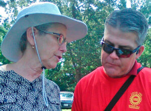 Joanne Kuniansky, SWP candidate for New Jersey governor, talks to UAW member Lucas Harville at Aug. 4 UMWA solidarity rally for striking miners at Warrior Met in Brookwood, Alabama.