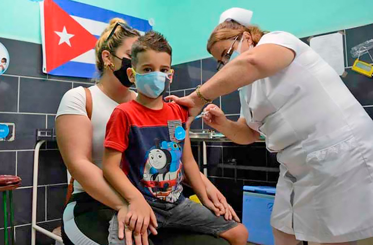 Child gets vaccinated against COVID in Cuba, Aug. 3. All Cubans down to 2-year-olds will be vaccinated by year’s end. Revolutionary Cuba exports its vaccines to Vietnam, Venezuela, and more.