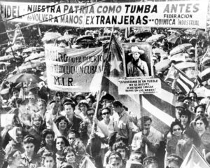 Rally in Havana in 1960 backs revolutionary government’s nationalization of imperialist- owned properties in Cuba. Workers mobilized to “intervene” to gain control of factories, part of Cuban toilers acquiring class consciousness, making socialist revolution their own.