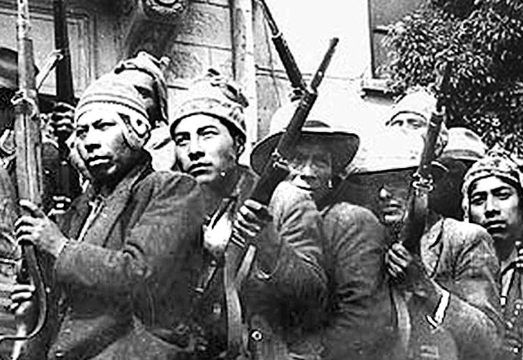 Militia during 1952 Bolivian national revolution. Decades of working-class struggles and a deepening prerevolutionary situation in southern countries of Latin America led Guevara to join Bolivian fighters in 1966 in an effort to begin socialist revolution across the continent.