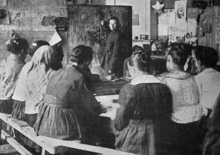 Women at literacy class after triumph of 1917 Bolshevik Revolution. “Social construction,” Leon Trotsky writes, must improve “the position of mother and child.” Without child care, health care, culture reaching women, including in the countryside, “socialism is unthinkable.”