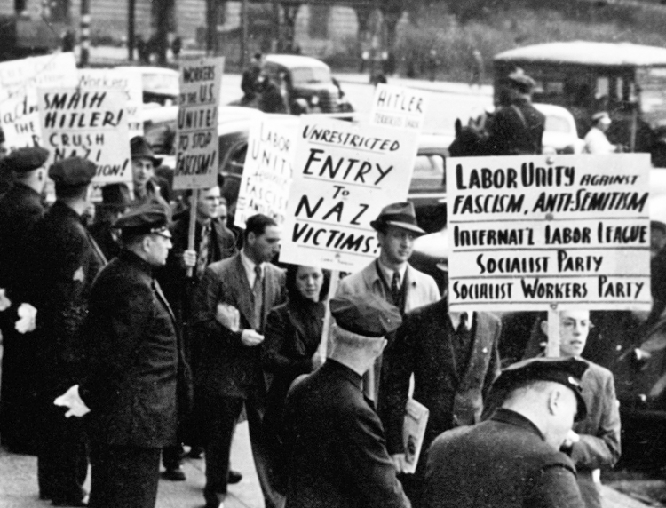 Members of Socialist Workers Party helped initiate picket at German Consulate in New York in November 1938 demanding Washington open its doors to Jewish and other victims of Nazi terror. Party resolution said road to end Jew-hatred was fight for workers power, socialism.