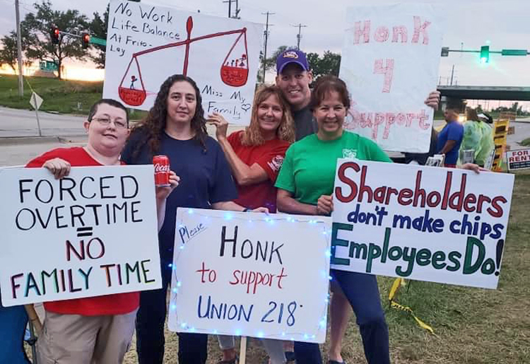 July Frito-Lay strike picket in Topeka, Kansas. Key issue was stopping forced overtime, expanding family time. Women’s participation in working class strengthens unions, women’s rights.
