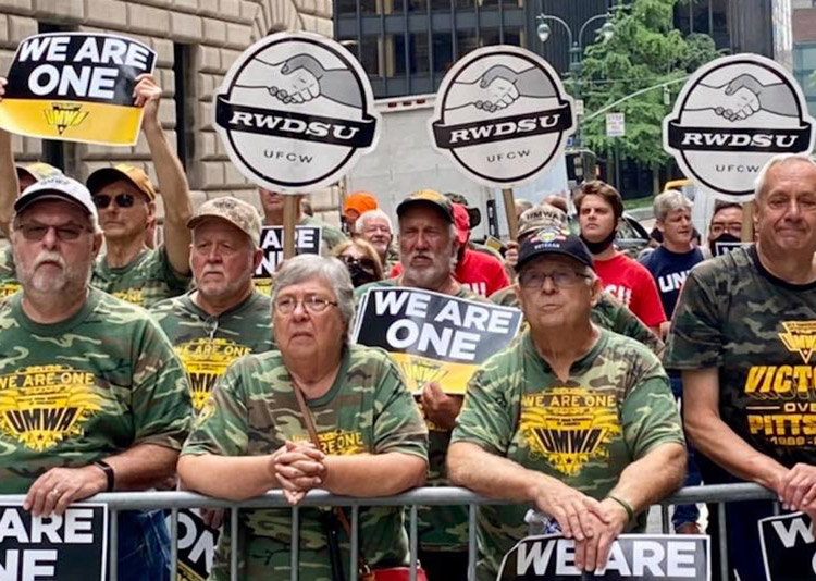 Striking Warrior Met coal miners from Brookwood, Alabama, members of United Mine Workers union, and their supporters protested at NY offices of hedge fund BlackRock July 28.