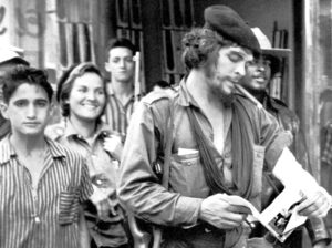 Che Guevara at the time of victorious battle of Santa Clara, which sealed the defeat of U.S.-backed Batista dictatorship. Harry Villegas is at right, Aleida March is second from left. Che played a leading role in everything from literacy classes for Rebel Army combatants in the mountains to theater and ballet for the soldiers under his command in La Cabaña fortress in early 1959.