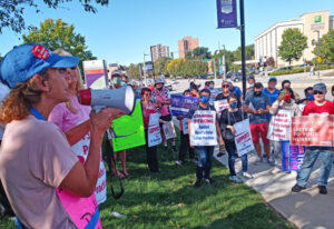 Marlena Pellegrino, a nurse who helped lead successful 10-month strike against St. Vincent Hospital in Worcester, Massachusetts, speaks at expanded picket line Sept. 25. The strike “was not about us, it was about all the fights” of the labor movement, she said as the strike ended.