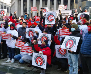 “We need a union,” speakers said at Feb. 1 rally of Uber and Lyft drivers and food delivery workers in New York. They are fighting for higher wages, job protection and better conditions.
