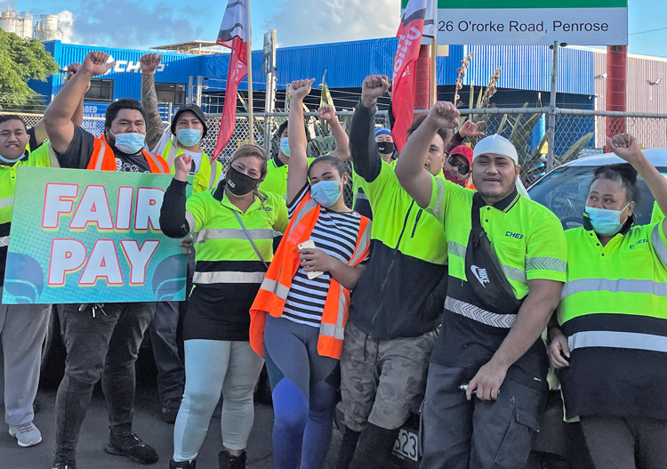 Members of FIRST Union on strike against CHEP pallet company in Auckland, New Zealand, picket in front of plant Feb. 18. The workers, facing rising prices, are demanding wage raise.