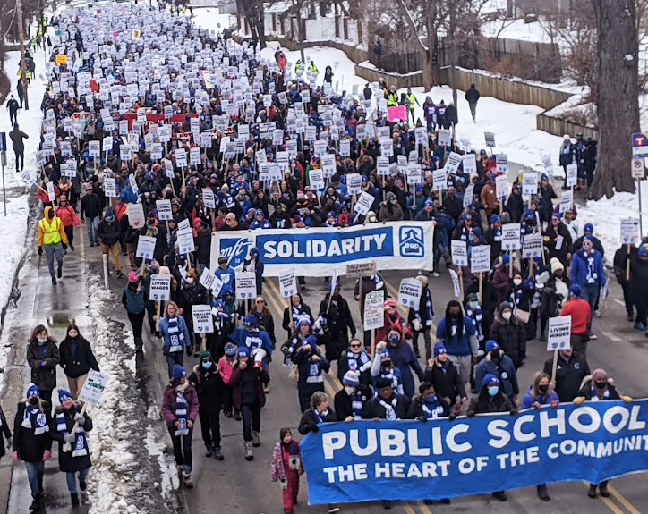 Minneapolis teachers and support staff march March 8 on first day of strike. Unionists approved contract March 27 with gains in wages, reduced class sizes, more school counselors.