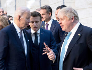 From left, U.S. President Joseph Biden, French President Emmanuel Macron and U.K. Prime Minister Boris Johnson at NATO war summit in Brussels, March 24. Behind smiles and handshakes, conflicting interests of all imperialist powers in NATO are sharpening.