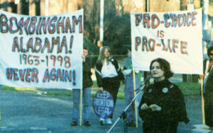 1998 Birmingham, Alabama, protest against clinic bombing, which killed a security guard, injured nurse. Roe v. Wade court decision cut off debate, fueling decades of rightist forces’ attacks on women’s rights. 