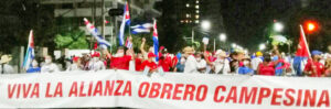 , Havana May Day march. Banner says, “Long live the Worker Peasant Alliance,” key to Cuba’s socialist revolution.