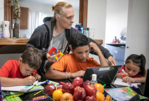 Heather Hernandez with three of her children, April 28, 2021. She was forced to quit her job as schools closed during the pandemic. There were millions of women in the same position.