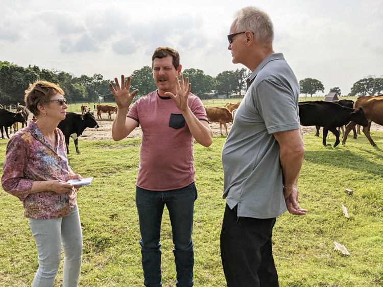 Alyson Kennedy, SWP candidate for governor, and Dennis Richter discuss challenges facing ranchers amid capitalist crisis with Nathaniel Turner, center, at his Fairfield ranch May 9.