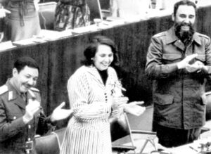 Vilma Espín, president of Federation of Cuban Women, at congress in Havana, March 1980, with Raúl Castro and Fidel Castro, right. Leaders of the revolution were determined to deepen women’s involvement, remove any obstacles to their shouldering political responsibilities.