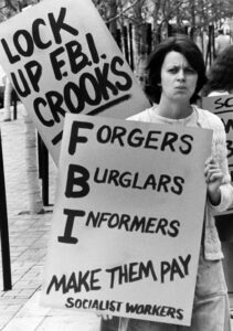 Picket in Cleveland, 1976, by supporters of 1973 SWP lawsuit against government use of FBI informers, spying, break-ins.