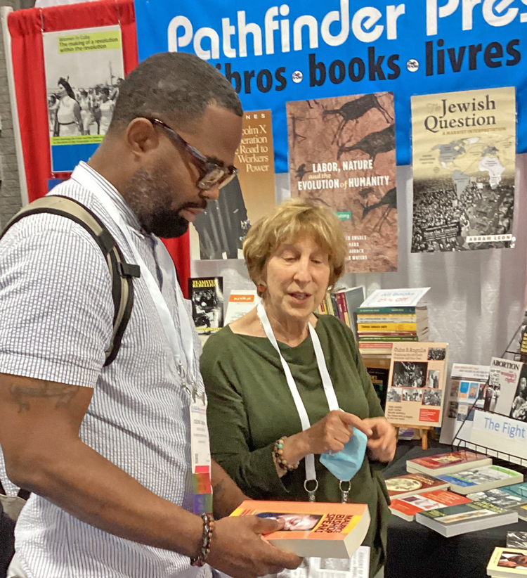 Participants in American Library Association conference in Washington, D.C., June 24-27 were attracted to books on revolutionary working-class struggles to order to have in their libraries.