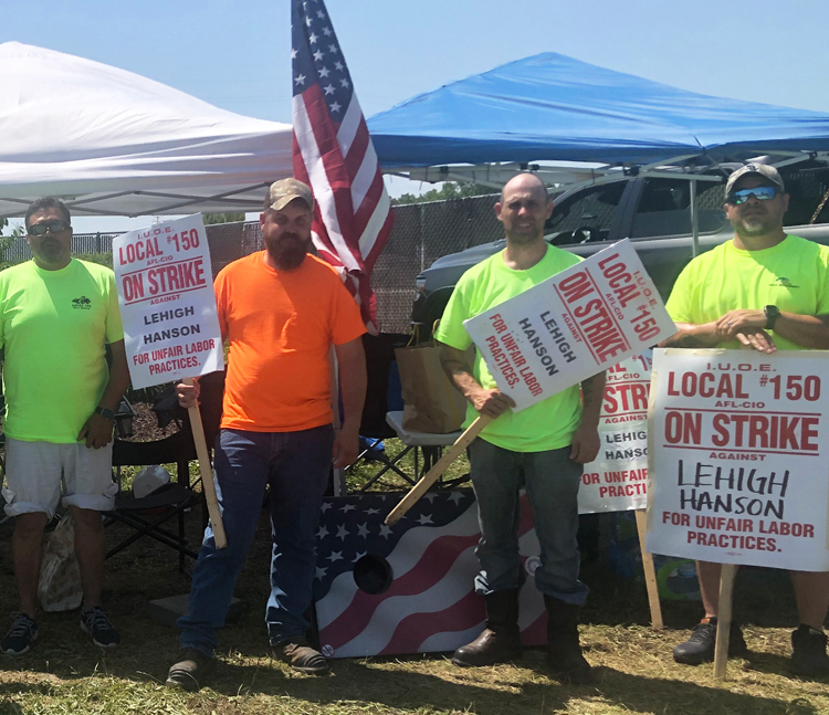 Members of International Union of Operating Engineers Local 150, on picket line June 14, struck after Chicago-area quarry bosses imposed changes to work rules and conditions.