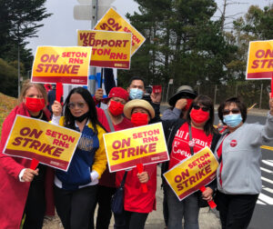 “We need adequate supplies and more staffing,” said nurse Emely Collado at Seton Medical Center in Daly City, California, during two-day strike called by California Nurses Association.