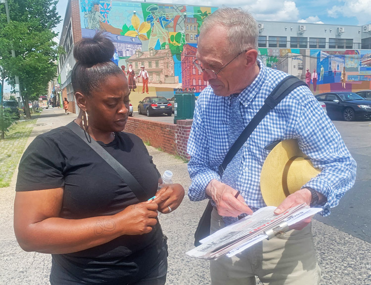 Philadelphia assistant teacher Charde James signed to put SWP candidate Chris Hoeppner on ballot for Congress, bought Militant and gave campaign donation to John Staggs, right.