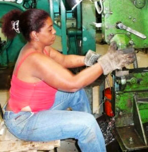 Machine operator, Villa Clara, Cuba, 2019. After revolutionary victory, proportion of women in labor force grew steadily, including in ‘nontraditional’ jobs.