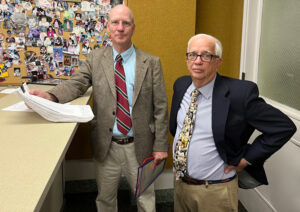 Chris Hoeppner, SWP candidate for U.S. Congress in Pennsylvania’s 3rd District, left, turns in nominating petitions July 27. Party prepared for fight after state official changed requirements. “You’re on the ballot! And good luck!” SWP attorney Larry Otter, right, told Hoeppner Aug. 9.