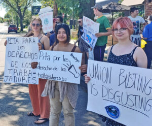 Workers picket Starbucks at Cedar Avenue South in Minneapolis Aug. 1, second day of two-day strike over low wages and understaffing. Workers had recently voted to unionize the store.